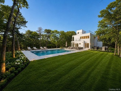 Set on 1.25 professionally landscaped acres bordering protected - photo 19