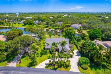Lake Home For Sale in Tequesta, Florida
