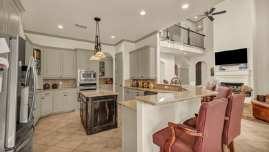 Step into this beautiful 4-bedroom home and instantly feel the - photo 13