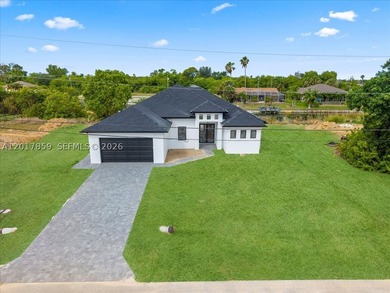 Emma Model | New Construction Pool Home in Cape Coral. Located - photo 3