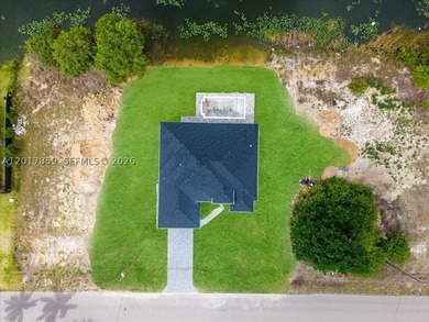 Emma Model | New Construction Pool Home in Cape Coral. Located - photo 4