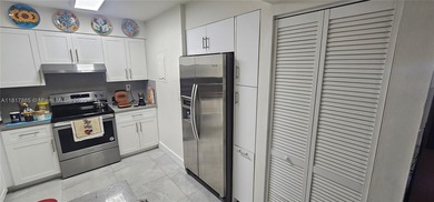 This completely remodeled 3-beds, 2-baths condo offers an