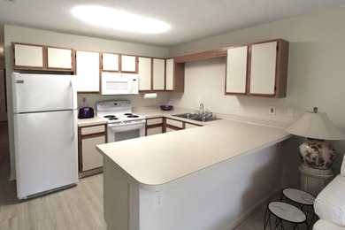 This 1st floor 1BR/1.5BA unit is located at Fairwood Lakes III - photo 6
