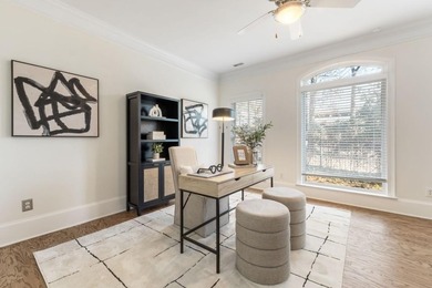 This highly appointed and updated Druid Hills townhome with