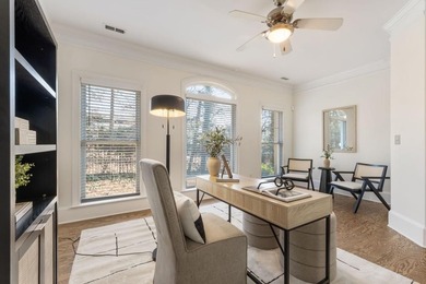 This highly appointed and updated Druid Hills townhome with