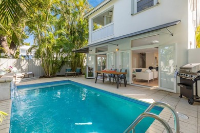 Located in a charming midtown neighborhood sits this beautifully - photo 2