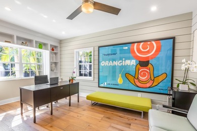 Located in a charming midtown neighborhood sits this beautifully - photo 8