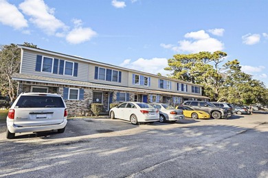 Enjoy beachside living in this nicely updated townhouse just 2.5 - photo 1