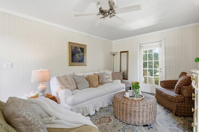 Tucked beneath a canopy of magnificent live oaks in Charleston's - photo 4