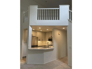 End unit in a private and quiet location overlooking trees in - photo 3