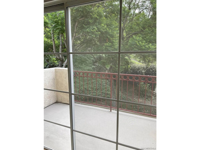 End unit in a private and quiet location overlooking trees in - photo 7