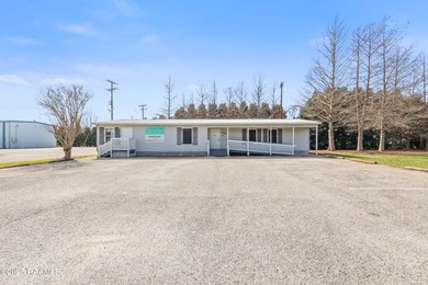This conveniently located commercial building is just off Hwy 90