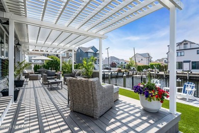 Elevate your life at the Jersey Shore with a home that redefines - photo 1