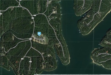 Be part of Whispering Woods and nestle your home among the trees - Lake Lot For Sale in Rogers, Arkansas