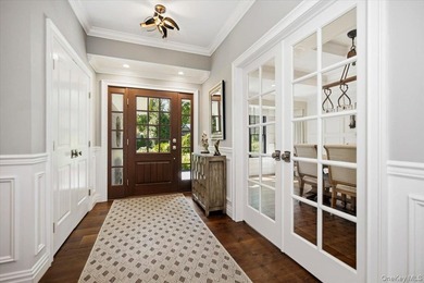Nestled on two private, professionally landscaped acres in the - photo 4