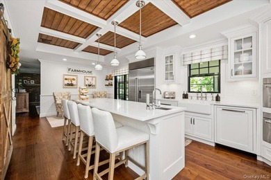 Nestled on two private, professionally landscaped acres in the - photo 5