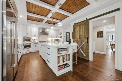 Nestled on two private, professionally landscaped acres in the - photo 7