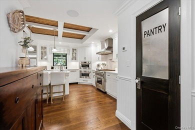Nestled on two private, professionally landscaped acres in the - photo 9