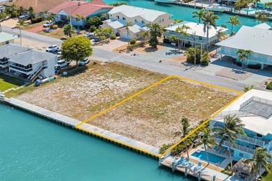 One of the last two duplex zoned, canal front, lots. New seawall - photo 3