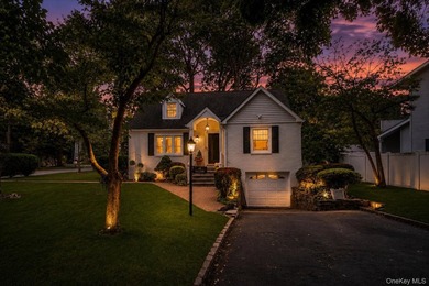 WELCOME HOME!! This charming brick Cape Cod with - photo 2