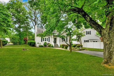 WELCOME HOME!! This charming brick Cape Cod with - photo 4