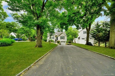 WELCOME HOME!! This charming brick Cape Cod with - photo 5