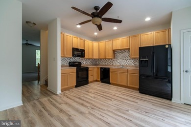 Nestled in the back of the community overlooking the pastures of - photo 5