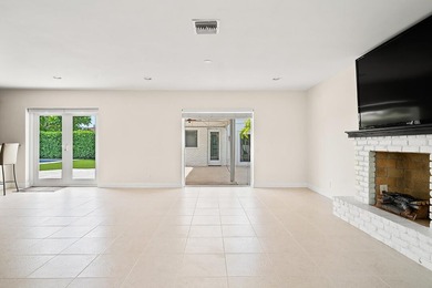 Situated on a 12,000+ sq ft lot with 100 feet of frontage, this - photo 9