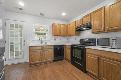 MUST SEE! This beautifully updated, single-level END UNIT - photo 7