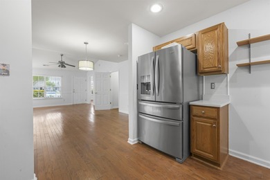 MUST SEE! This beautifully updated, single-level END UNIT - photo 8