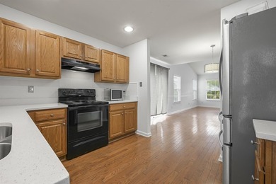 MUST SEE! This beautifully updated, single-level END UNIT - photo 9