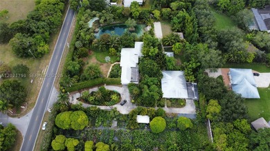 Prepare to be enchanted by this tropical oasis nestled in the - photo 13