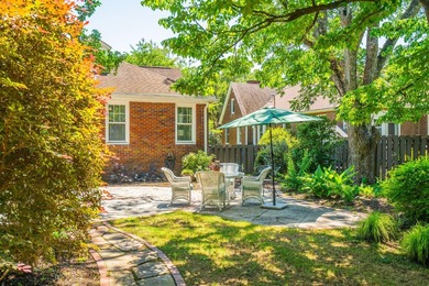 Charming brick home on a quiet family street that is located - photo 4