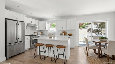 Welcome to 133B Shinnecock Avenue, a radiant gem nestled in - photo 4