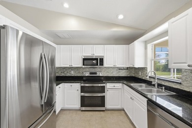Welcome to this beautifully maintained 3-bedroom, 3-bathroom - photo 7