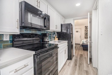 This updated 1-bedroom direct oceanfront condo in the Pinnacle