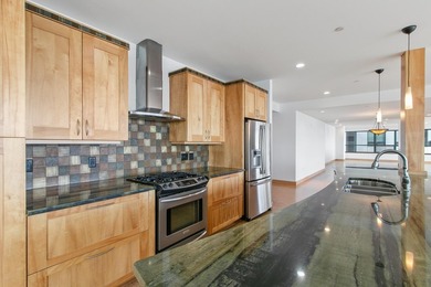 Stunning Lake Monona View Condominium. A dramatic great room