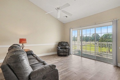 Enjoy spectacular golf course views from this third-floor - photo 3