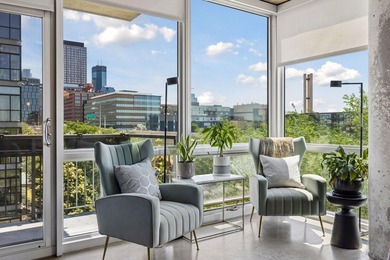 Absolutely stunning west-facing corner unit with expansive - photo 11