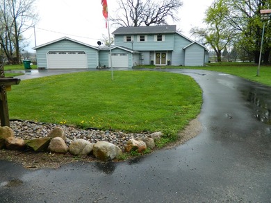 150 ft. of water frontage .Lot has in ground sprinklers and - photo 1