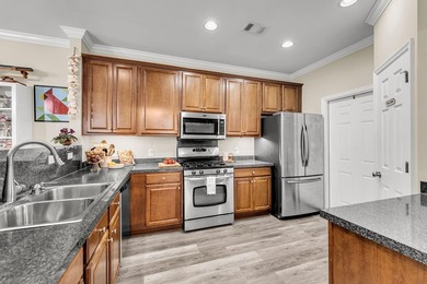Welcome to The Gates at Fenwick Plantation! This move-in-ready - photo 6