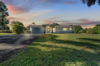 Lake Home For Sale in Loxahatchee, Florida