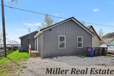 *Lake life done right* Gun Lake home tucked at the end of a - photo 3