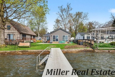 *Lake life done right* Gun Lake home tucked at the end of a - photo 4