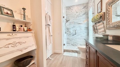 This stunningly renovated home offers modern luxury and peace of - photo 17