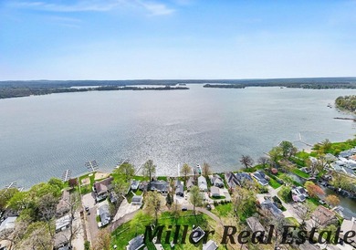 *Lake life done right* Gun Lake home tucked at the end of a - photo 9