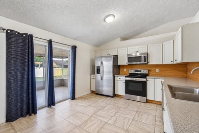 Welcome to this beautifully maintained Palm Bay home blending - photo 8