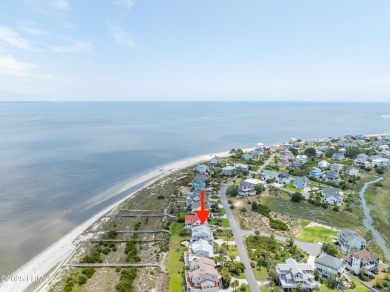 Experience beachfront living like no other at this