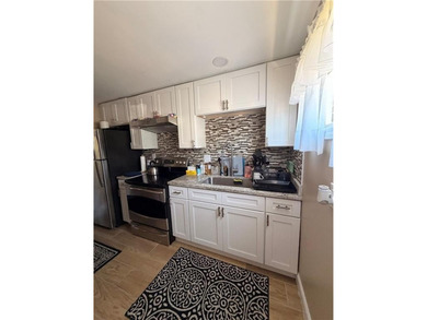Rocks throw from Narragansett Bay! This extensively renovated - photo 10