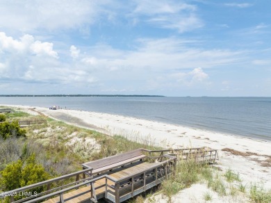 Experience beachfront living like no other at this